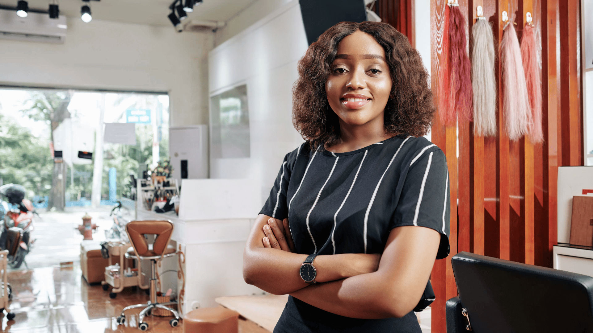 Afro hair professional in her salon
